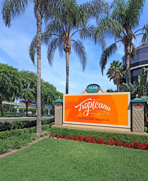 Tropicana's sign outside the hotel with the Disneyland monorail going by in the background